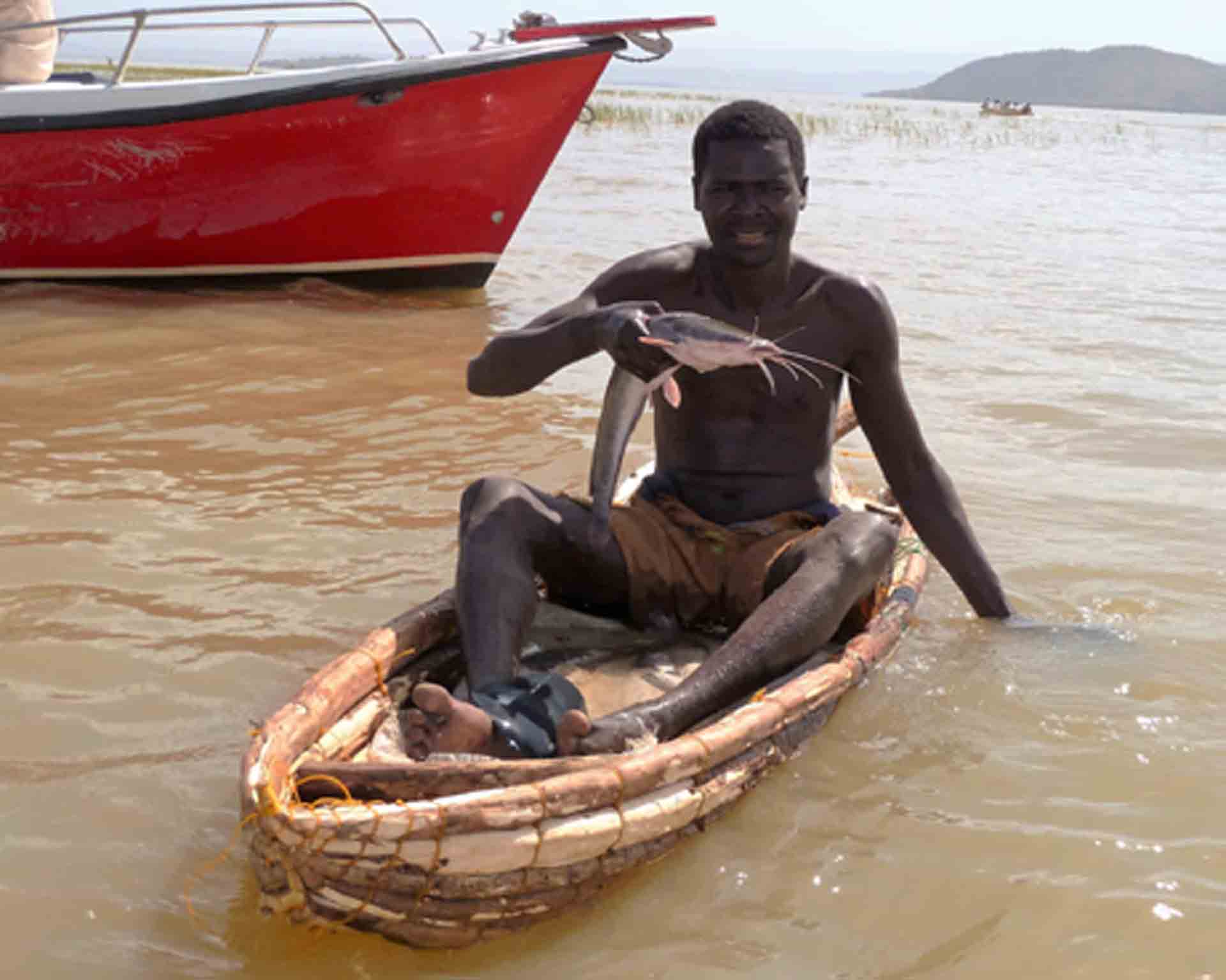 man in fishing boat